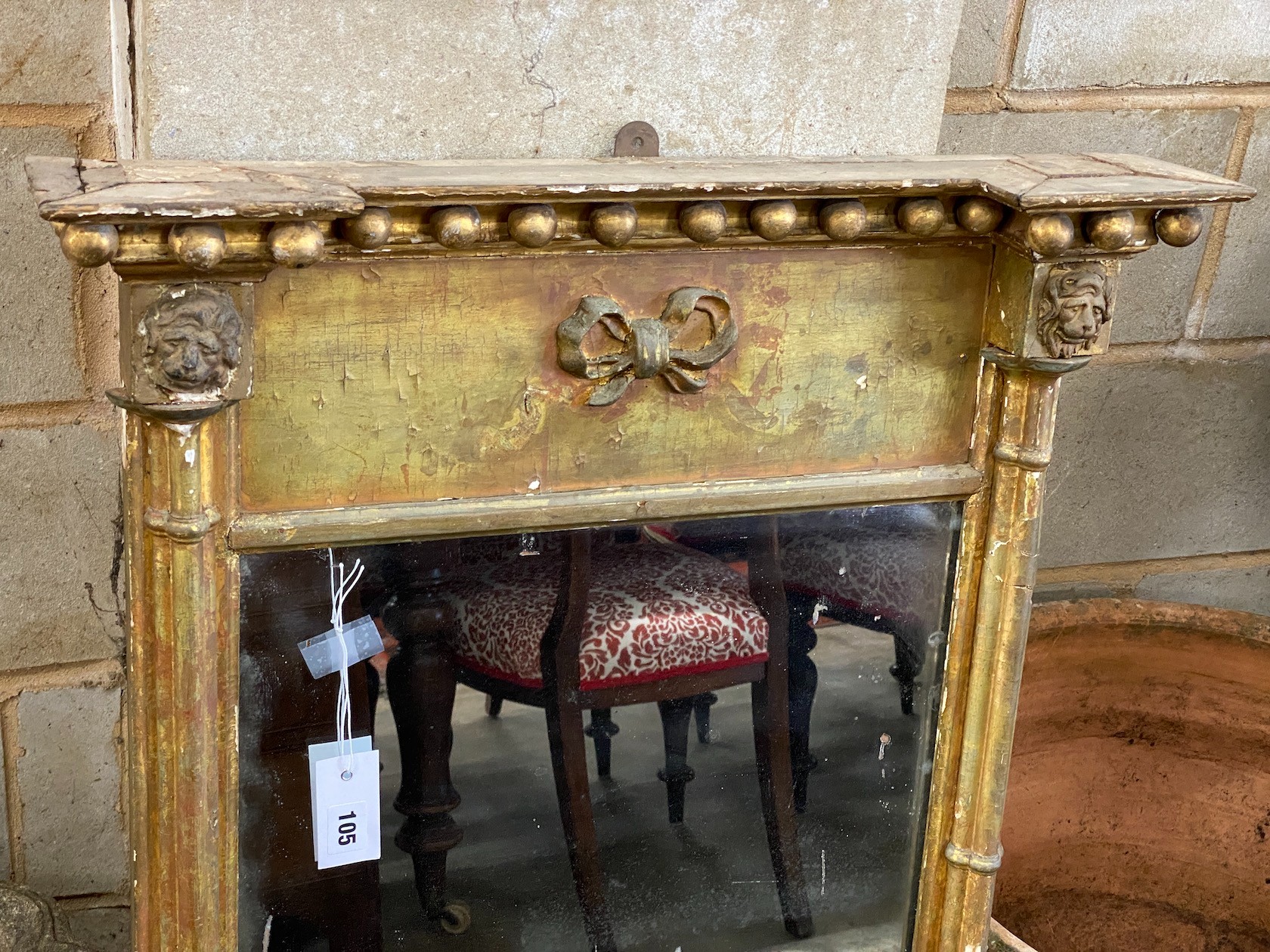 A Regency giltwood and composition pier glass, width 64cm, height 108cm